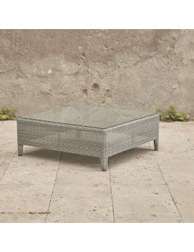 Oceane garden coffee table with tempered glass top French grey rattan pictured on Southern French terrace.