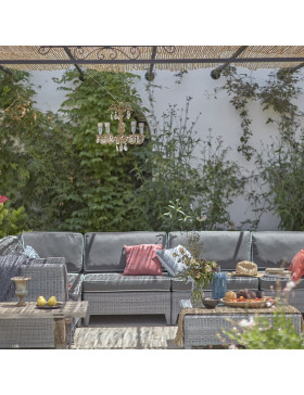 L- shaped modular garden furniture set in French grey with footstool and corner coffee table in Southern French garden